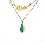22 Karat Gold Framed Blue Opal On Silk