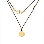 14 Karat Gold Aries Zodiac Charm On Brown Silk