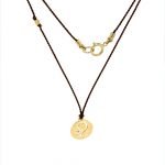 14 Karat Gold Leo Zodiac Charm On Brown Silk