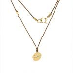 14 Karat Gold Libra Zodiac Charm On Light Brown Silk