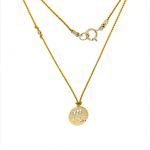 14 Karat Gold Scorpio Zodiac Charm On Yellow Silk