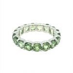 18 Karat White Gold Green Sapphire Eternity Ring