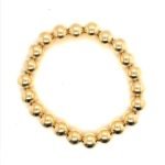 Stretch Bracelet with Gold Plated Beads
