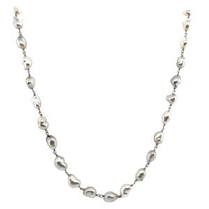 Elegant freshwater pearl necklace featuring irregular shaped pearls linked with delicate silver chain, perfect for adding a touch of sophistication to any outfit.