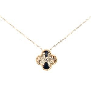 Gold flower pendant necklace featuring a black enamel design and a central crystal accent, perfect for elegant attire and special occasions.